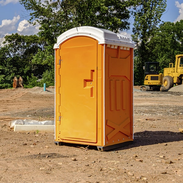 how often are the portable restrooms cleaned and serviced during a rental period in Mclean County